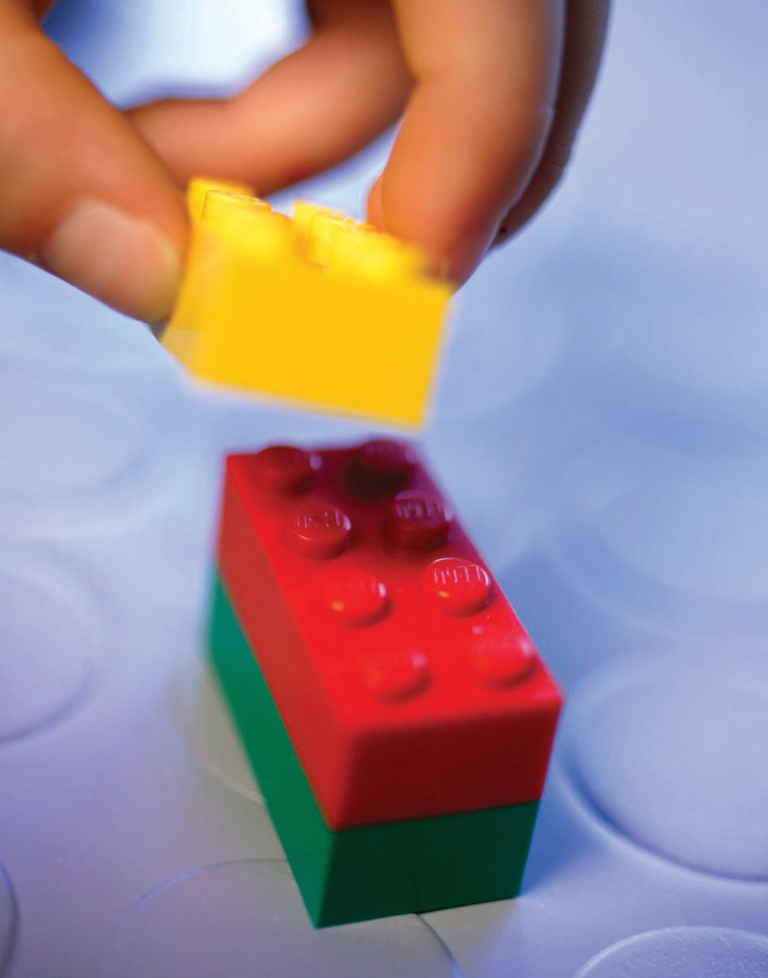 Mattoncini Lego / Lego bricks being stacked. Courtesy: The LEGO Group.