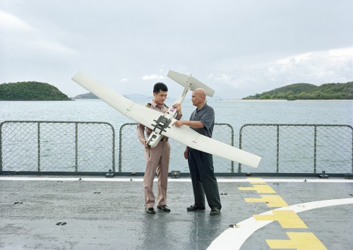 An-My Lê, Demonstration of Puma AE Unmanned Aircraft System, HTMS Nareasuan, Sattahip Naval Taining Center, Thailand, 2010, from Events Ashore (Aperture, 2014). © An-My Lê, courtesy Murray Guy Gallery, New York.