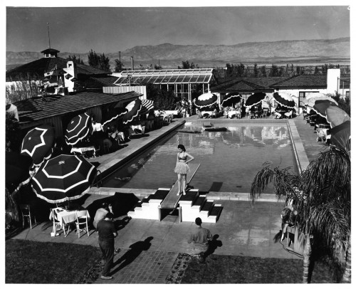 A fashion show is held by the pool at the Racquet Club of Palm Springs in 1939. Courtesy Palm Springs Historical Society.