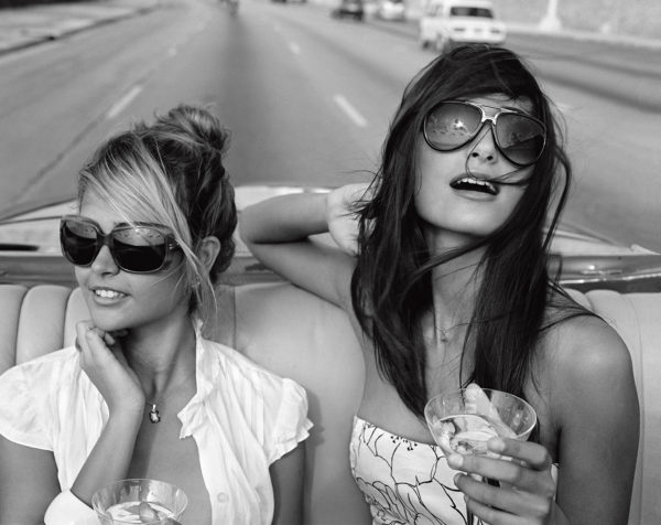 Giselle and Rachel cruising the Malecon, La Habana, Cuba, 2009. © Michael Dweck.