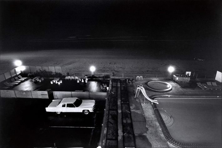 Car at a swimming pool, Florida, 1975: Photo: Elliott Erwitt. © Elliott Erwitt/Magnum Photos.