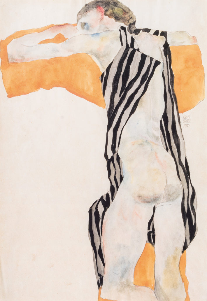 Egon Schiele, Liegender Mädchenakt in gestreiftem Kittel (Reclining Nude Girl in Striped Smock), 1911. Pencil and watercolor on paper. Private collection, Vienna. Courtesy of Kunsthandel Giese & Schweiger, Vienna Picture: © Kunsthandel Giese & Schweiger, Vienne.